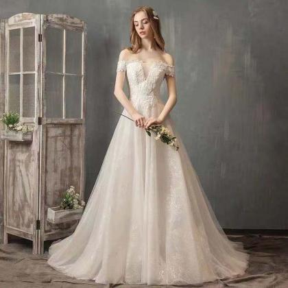 Ivory Tint Wedding Dress Off Shoulder Wedding..
