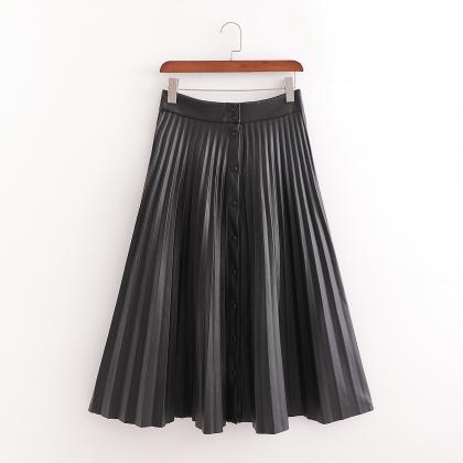 Mid - length leather pleated skirt ..