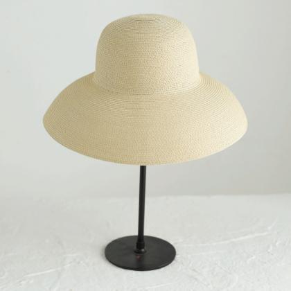 Straw hat with large eave, travel s..