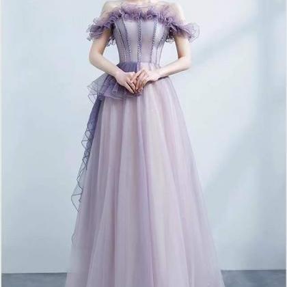 Purple off shoulder prom gown, star..
